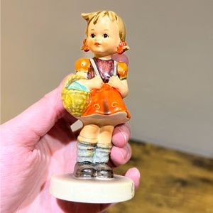 Hummel School Girl Holding a Basket Figurine